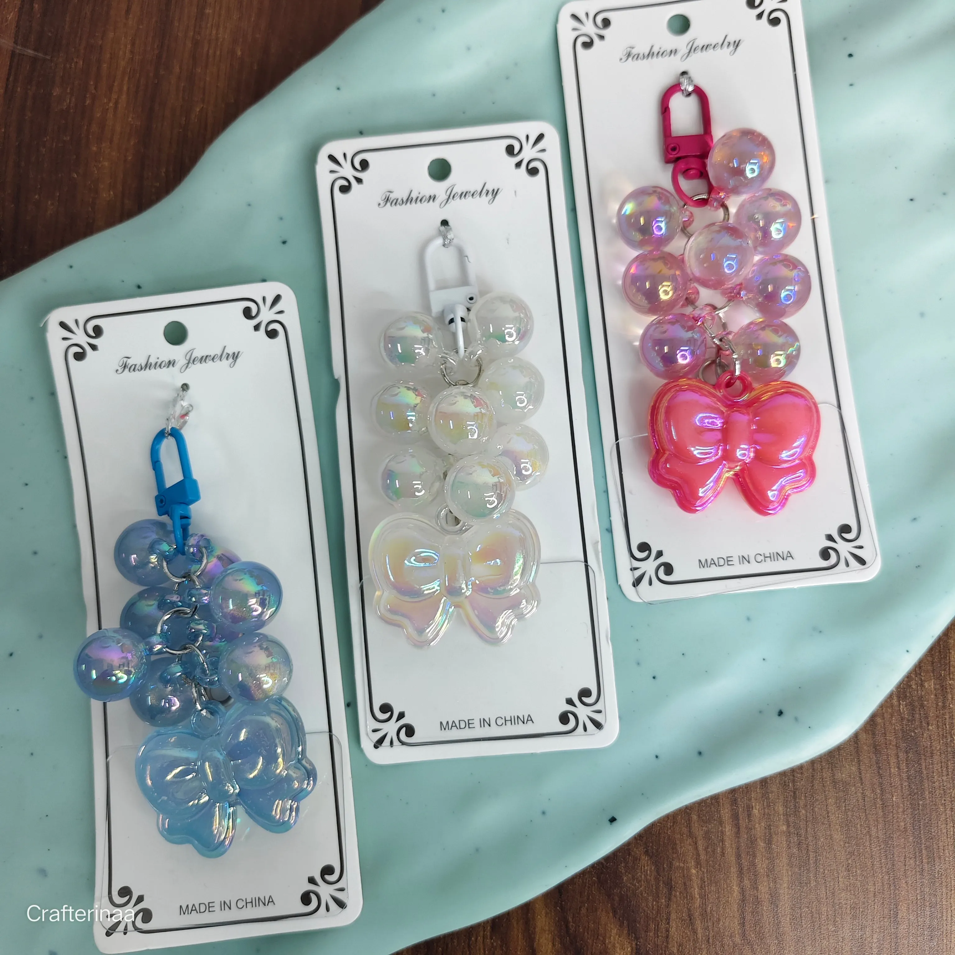 Holographic pearls with bow charm | holographic keychain