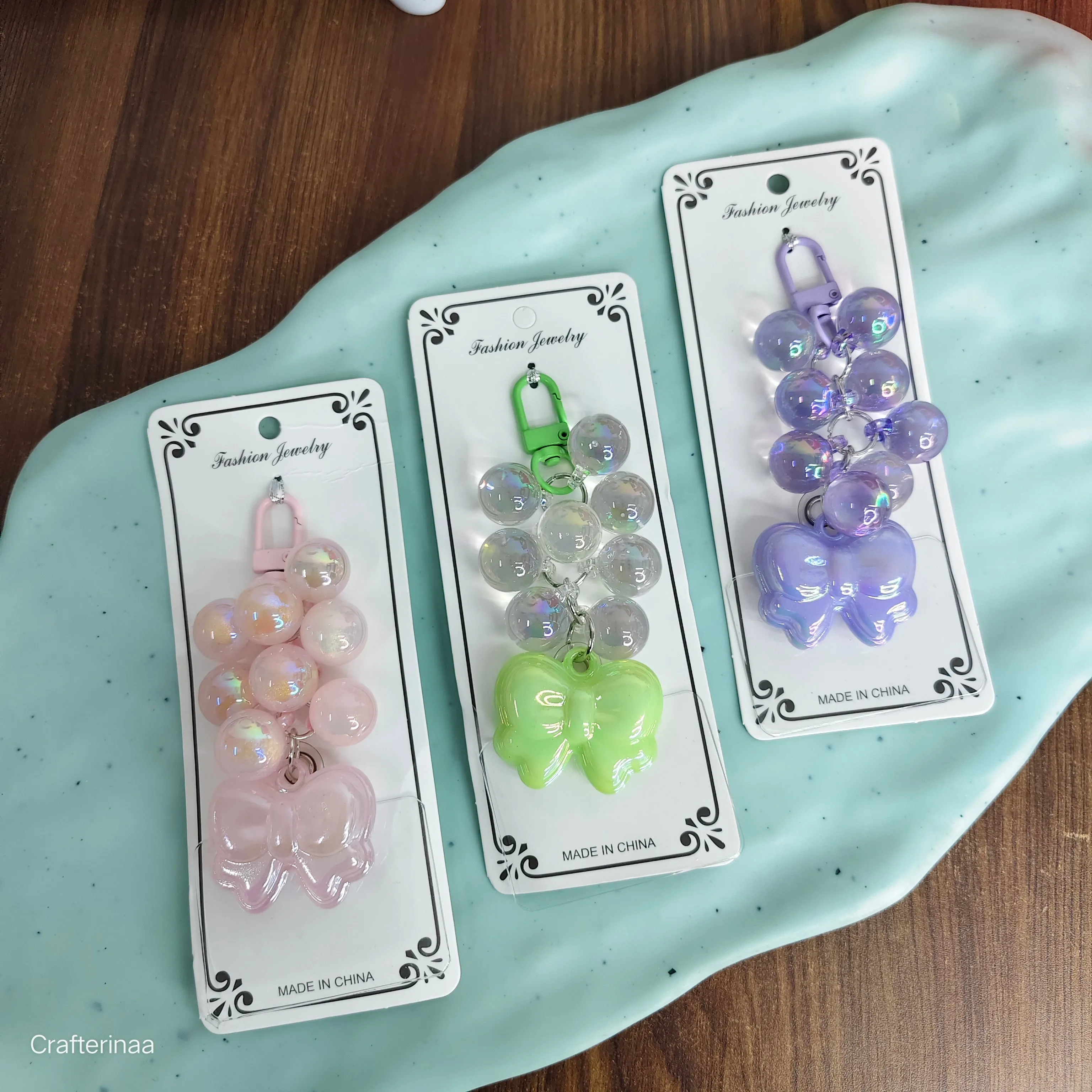 Holographic pearls with bow charm | holographic keychain
